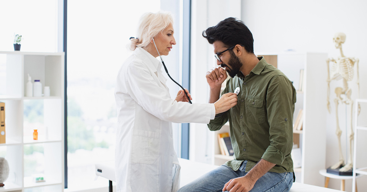 A doctor checking out a patient.