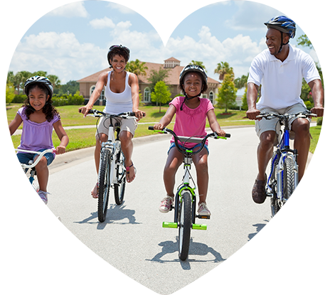 A healthy, happy family riding bicycles together, celebrating their health thanks to AllCare Georgia.